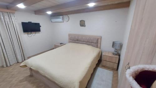 Ein Bett oder Betten in einem Zimmer der Unterkunft Guest House Lakada