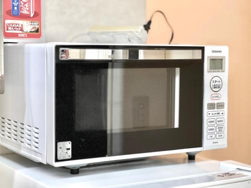 Akazu-hostel newにあるキッチンまたは簡易キッチン