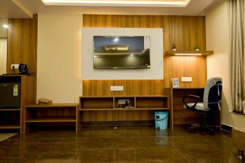 TV a/nebo společenská místnost v ubytování Hotel Kapson