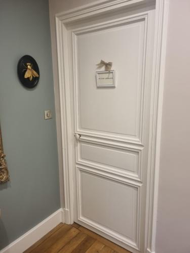 a white door with a box on it at Villa Eulalie B&B Guest House nestled in the Champagne area in Bligny