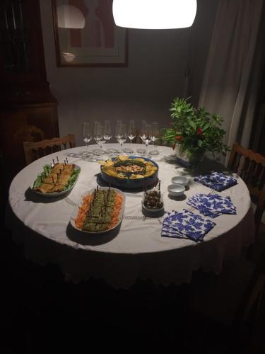 a table with several plates of food on it at CASA LIBERTINI in Grammichele