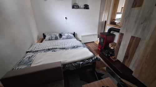 Postel nebo postele na pokoji v ubytování Apartman A&J 2