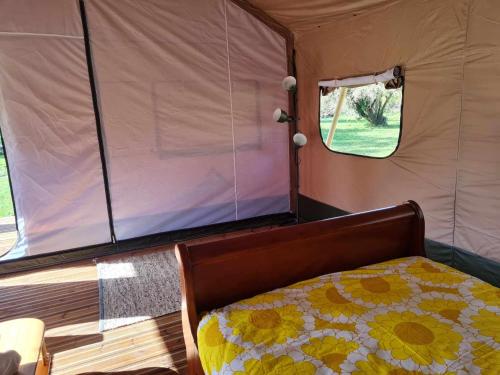 Ένα ή περισσότερα κρεβάτια σε δωμάτιο στο Camping de la touche