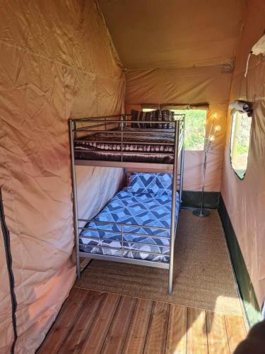 Ένα ή περισσότερα κρεβάτια σε δωμάτιο στο Camping de la touche