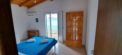 Ένα ή περισσότερα κρεβάτια σε δωμάτιο στο Hidden paradise