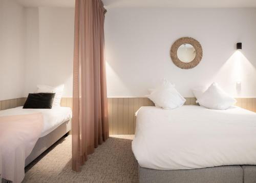 Ένα ή περισσότερα κρεβάτια σε δωμάτιο στο Hotel Augustyn Brugge
