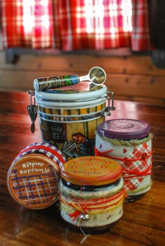 a group of three jars of food on a table at Colours' Chalet in Synikia Mesi Trikalon