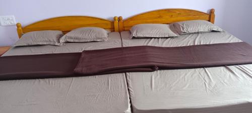 Säng eller sängar i ett rum på Saisagar beach resort