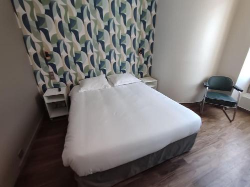 Ένα ή περισσότερα κρεβάτια σε δωμάτιο στο Appartement quartier Chartrons étage 1