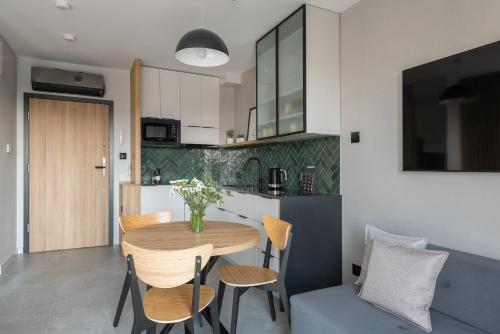 Kuchyň nebo kuchyňský kout v ubytování AVAPARTS apartament GREEEN