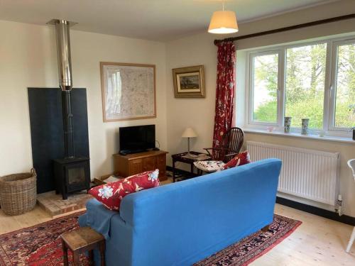 Χώρος καθιστικού στο Cosy retreat in the heart of the Cotswolds.