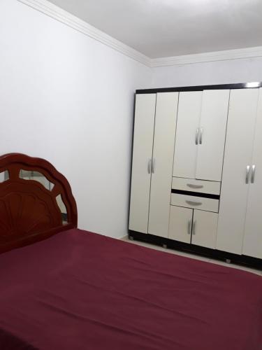 Ліжко або ліжка в номері Apartamento temporada - Praia do Sul