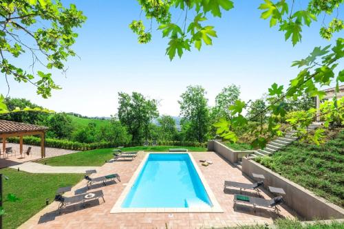 A piscina localizada em Villa Il Sole Marcheholiday ou nos arredores