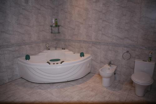 A bathroom at Exciting seaview villa Aymesa