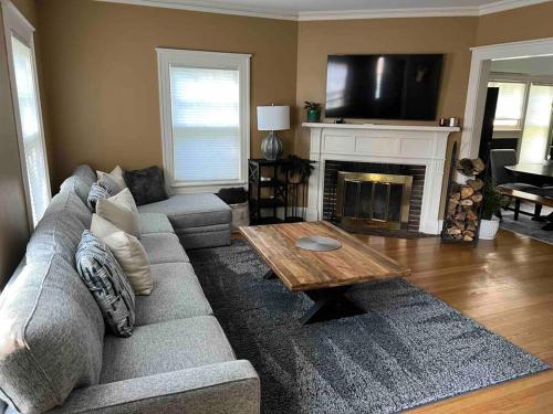 a living room with a couch and a coffee table at Beautiful Luxury Suite B of Shorewood Home in Shorewood