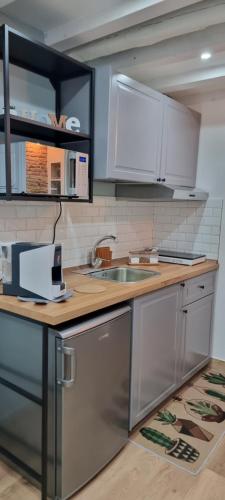 Una cocina o zona de cocina en Le Antiche Porte
