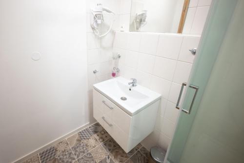 Koupelna v ubytování PAPI Apartmán