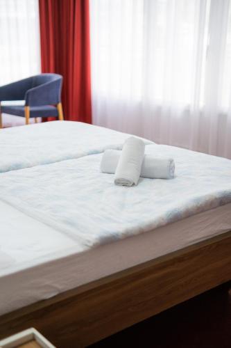 Ένα ή περισσότερα κρεβάτια σε δωμάτιο στο Soba Kašmir