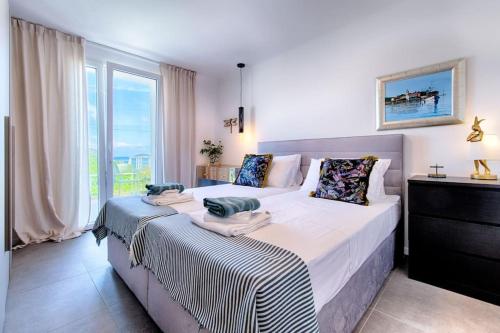 Postel nebo postele na pokoji v ubytování Apartment Marija
