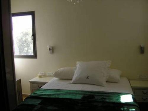 Posteľ alebo postele v izbe v ubytovaní Herzliya Pituach Apartment with Pool, by the Beach