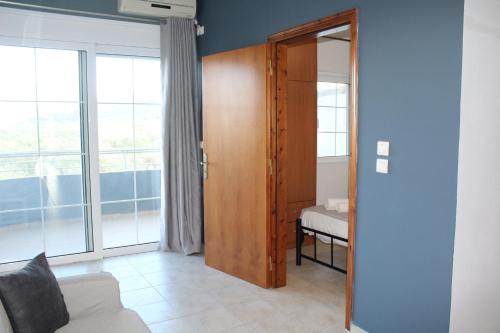 Katil atau katil-katil dalam bilik di Village Drapanias Apartments
