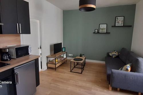 Bel appartement rez-de-chaussée cour proche centre