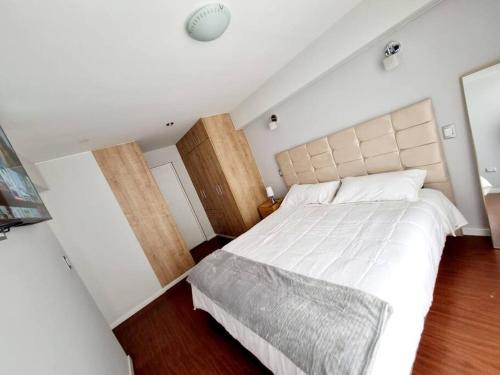 Llit o llits en una habitació de Departamento Amplio y Centrico en Arequipa