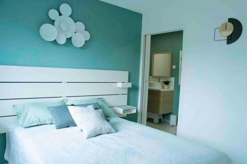 Ένα ή περισσότερα κρεβάτια σε δωμάτιο στο Appartement 5min aéroport CDG