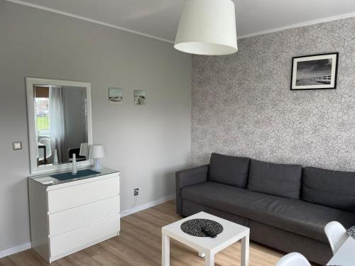 Posedenie v ubytovaní Apartament Ogrody