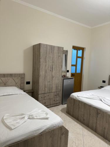 Postel nebo postele na pokoji v ubytování VILA Eljus