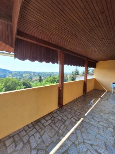 a balcony of a house with a view at Kuća za odmor Magdalena in Vrtlinovec