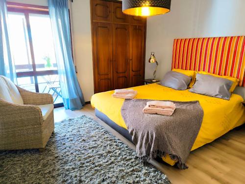 En eller flere senge i et værelse på Praia de Vila do Conde com vista a mar