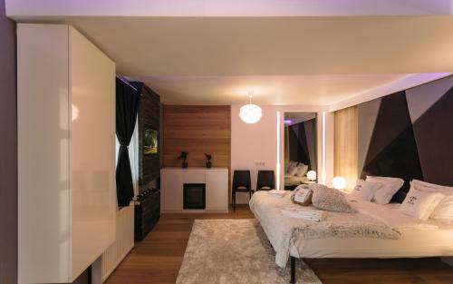 Katil atau katil-katil dalam bilik di Daan Apartments