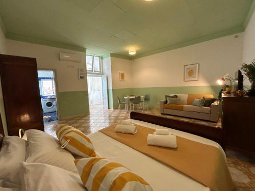Katil atau katil-katil dalam bilik di Casa Maria Rosa - seaside apartment