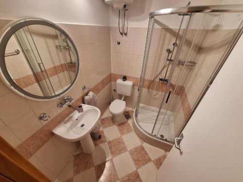 Koupelna v ubytování Apartments Benic