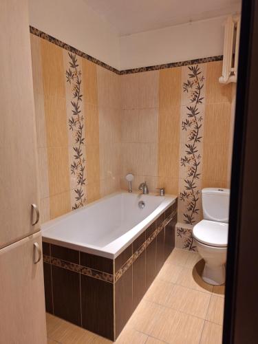 Ванная комната в Turkusowa Apartament