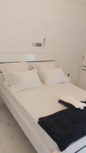 Cama o camas de una habitación en El Residanciel Palmiers 1