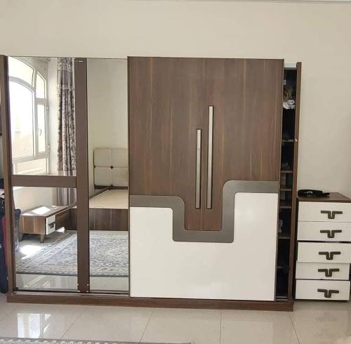 a sliding glass door in a living room at Hageb 