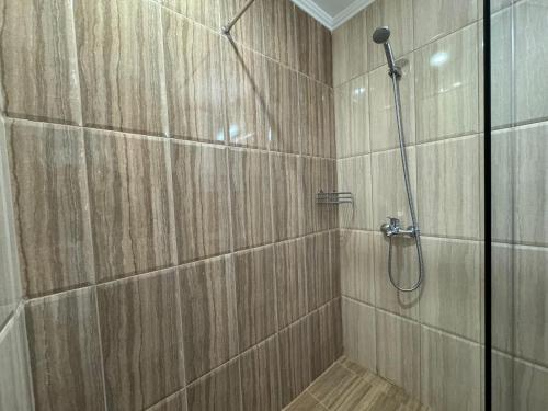 a bathroom with a shower with a glass door at HORIZON 12 'A' APARTMENT Sveti Vlas in Sveti Vlas