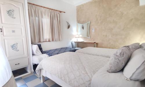 Ένα ή περισσότερα κρεβάτια σε δωμάτιο στο Panorama Studios & Apartments