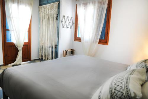 Ένα ή περισσότερα κρεβάτια σε δωμάτιο στο Panorama Studios & Apartments
