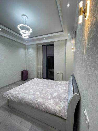 Cama ou camas em um quarto em Premium apartment for guests in Yunusobod