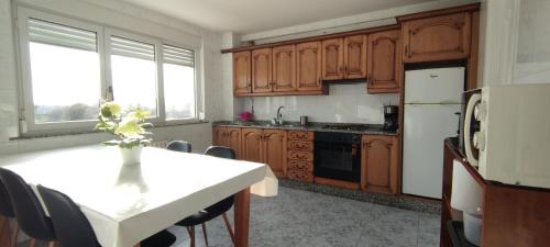 Η κουζίνα ή μικρή κουζίνα στο Xabarin Apartment