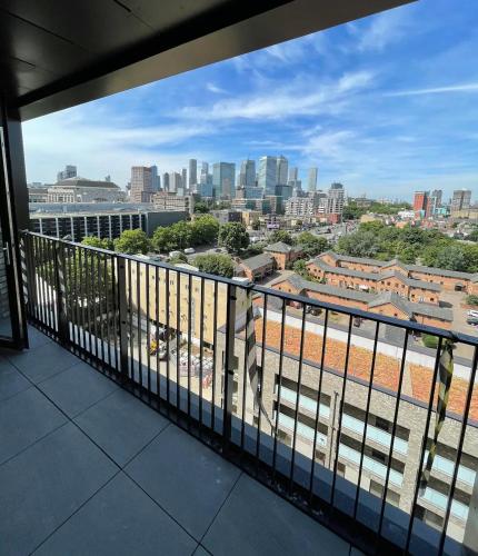 a balcony with a view of the city at Cheap ROOM with great Canary Wharf city view in London