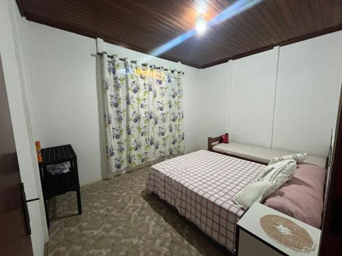 מיטה או מיטות בחדר ב-sitio dona cida e joze