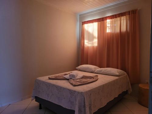 Säng eller sängar i ett rum på Lugarzin2 - Casa Privada - Garagem Compartilhada