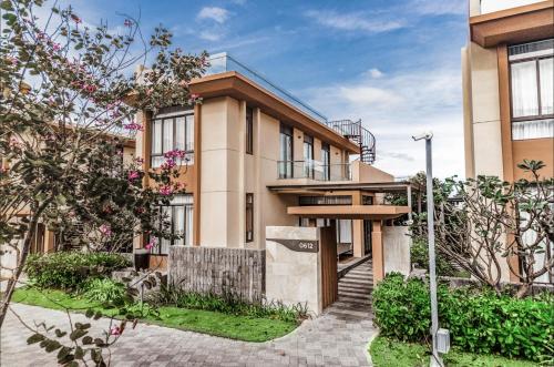 an exterior view of a building at Hese Pool Villas & Resort Cam Ranh in Cam Ranh