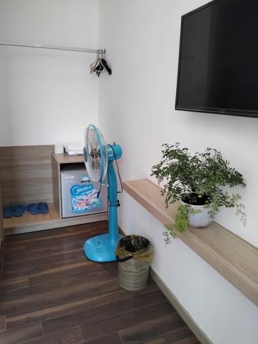 Телевизор и/или развлекательный центр в Vindy House