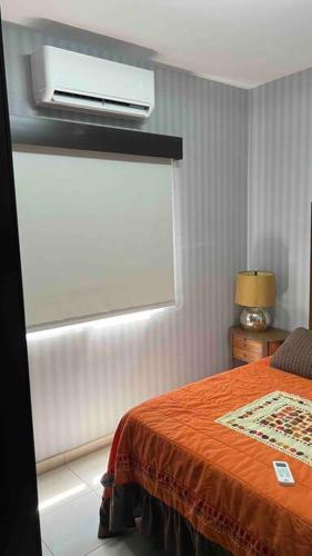 Ένα ή περισσότερα κρεβάτια σε δωμάτιο στο Agradable Casa Madeira Tijuana Rosarito