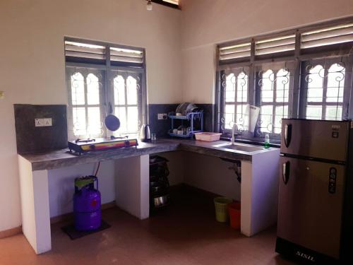 Una cocina o kitchenette en Susha Hostel